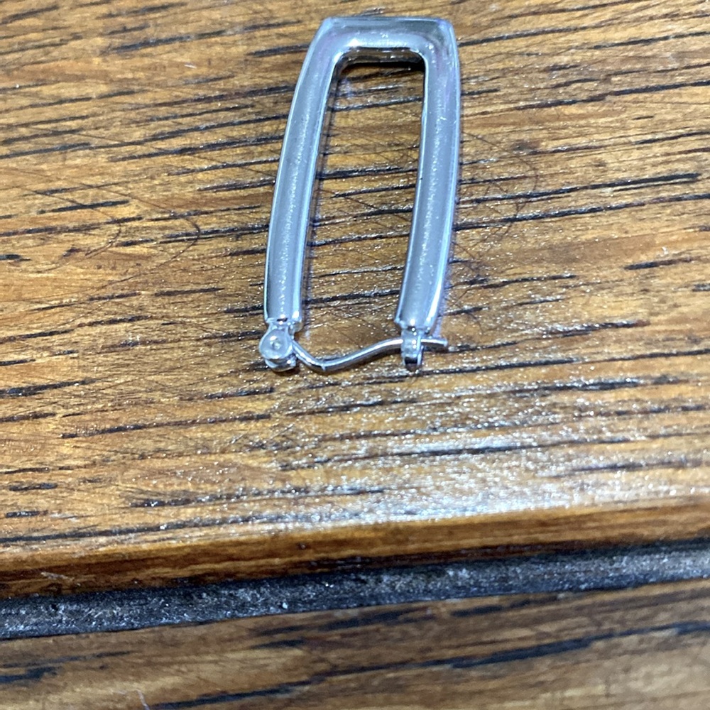 Silver 1.5 in rectangle pierced earrings. Very secure and light. They are pretty - Picture 8 of 12